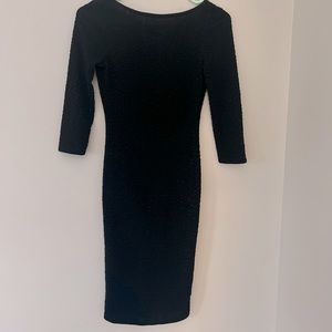 Womens knee-length black fitted dress 2